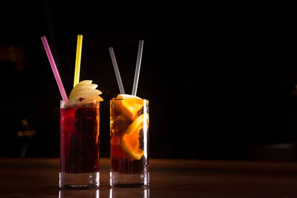 Cherry bomb and cuba libre cocktails in a tall glasses — Stock Photo, Image