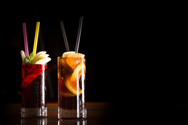 Cherry bomb and cuba libre cocktails in a tall glasses — Stock Photo, Image