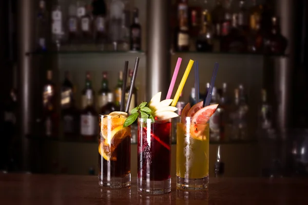 Cherry bomb, screwdriver and cuba libre cocktails in a tall glas — Stock Photo, Image