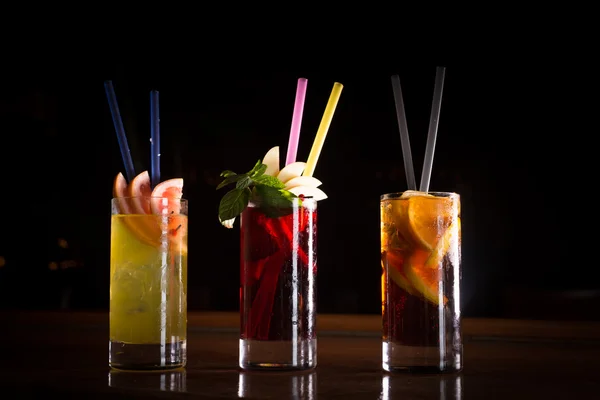 Cherry bomb, screwdriver and cuba libre cocktails in a tall glas — Stock Photo, Image