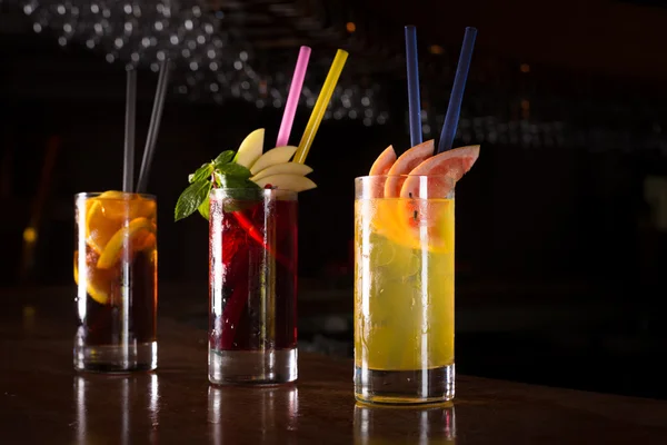 Cherry bomb, screwdriver and cuba libre cocktails in a tall glas — Stock Photo, Image