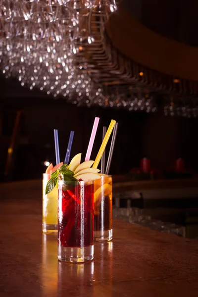 Cherry bomb, screwdriver and cuba libre cocktails in a tall glas — Stock Photo, Image