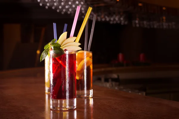 Cherry bomb, screwdriver and cuba libre cocktails in a tall glas — Stock Photo, Image