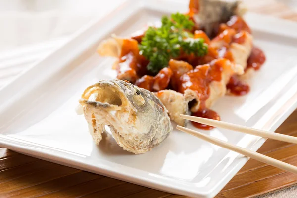 Japanese style fried sea bass, served with sweet and sour sauce — Stock Photo, Image