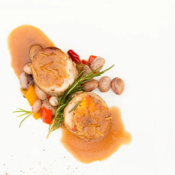 Rabbit stuffed with wild mushrooms, served with sauted haricot b — Stock Photo, Image