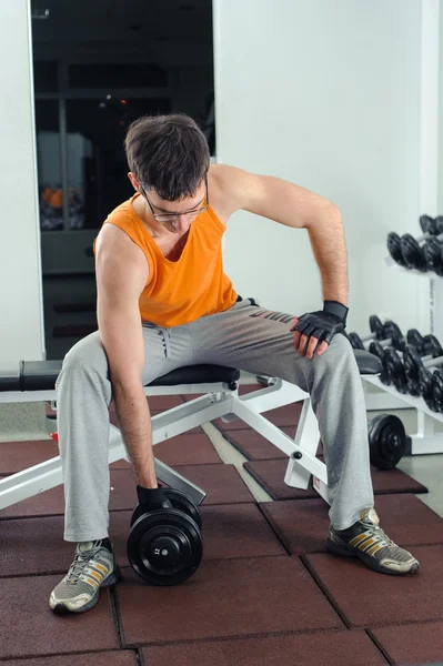 Exercises for the hands with dumbbells — Stock Photo, Image