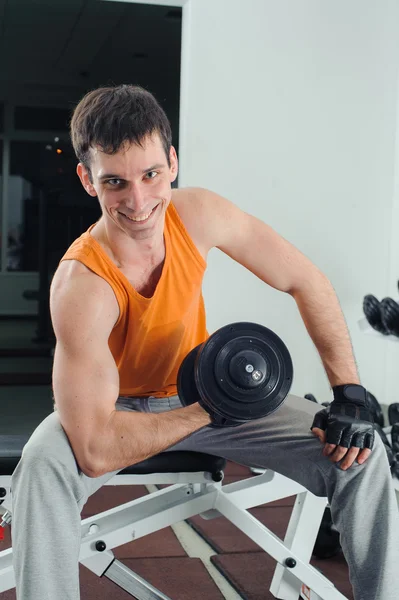 Exercises for the hands with dumbbells — Stock Photo, Image