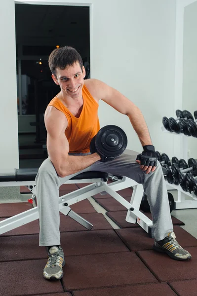 Exercises for the hands with dumbbells — Stock Photo, Image