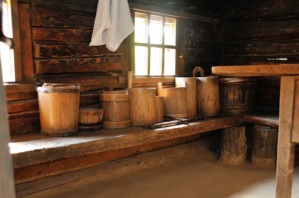 Many old wooden buckets in the old hut. Sauna — Stock Photo, Image