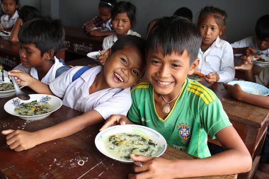 Ranchi, Jharkhand/India- January 27 2020 : kids eating at school 