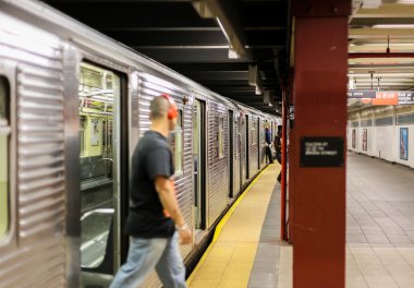 Passengers in New York Metro clipart