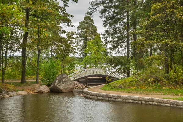 Chinese bridge at Column island in Monrepos park. Vyborg town. Russia