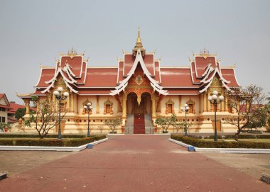 Hor Thammasapha (Buddhist Convention Hall) of Wat That Luang Nuea (Nua) temple in Vientiane. Laos clipart