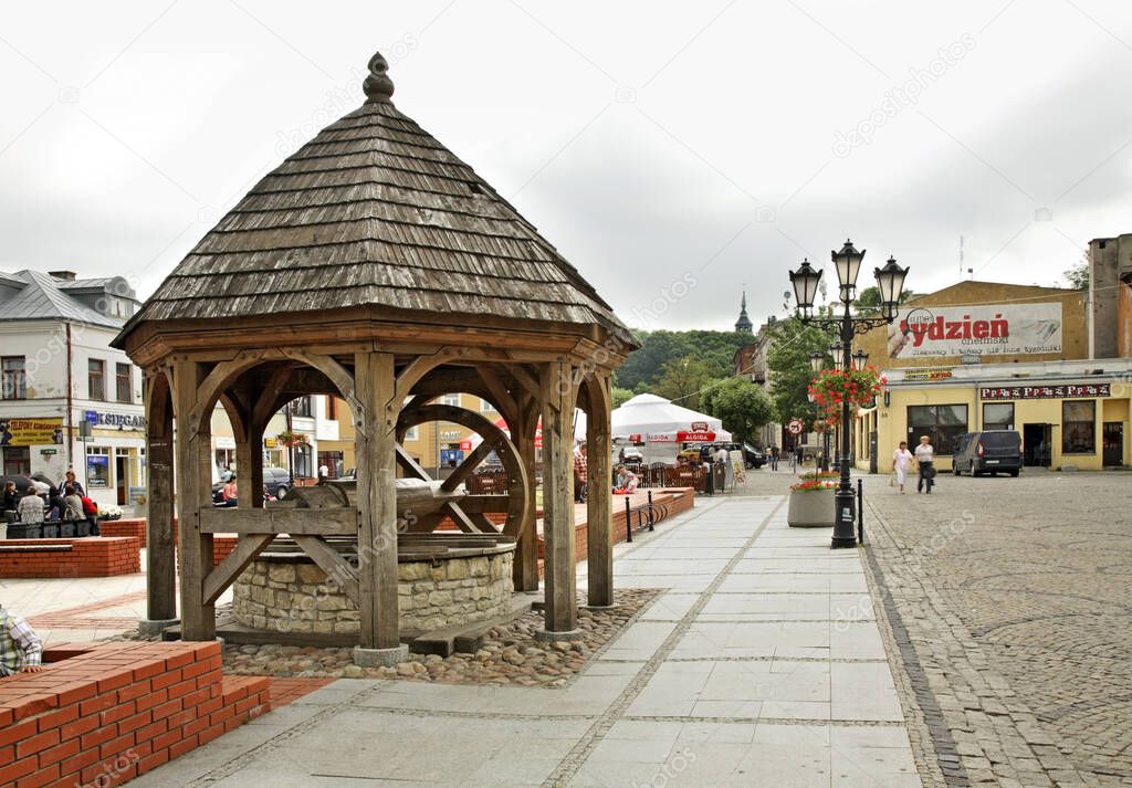 Water well on Luczkowski square - Old city market square in Chelm. Poland