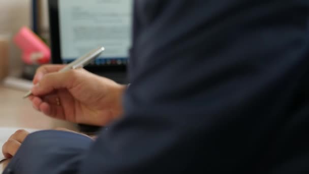 Male businessman hands in suit sign paper, 4k UHD 2160p, dolly slider shot — Stock Video