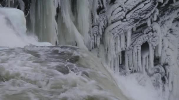 Sweden Tannforsen waterfall, winter — Stock Video