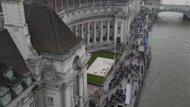 Aerial view zoom in on county hall now hotel england uk europe — Stock Video