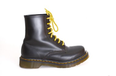 Classic black lace-up boot with yellow laces clipart