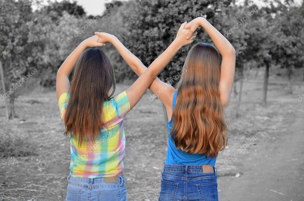 Two Best Friend Girls Making A Forever Sign Stock Photo Image By C Dnaveh 65321295