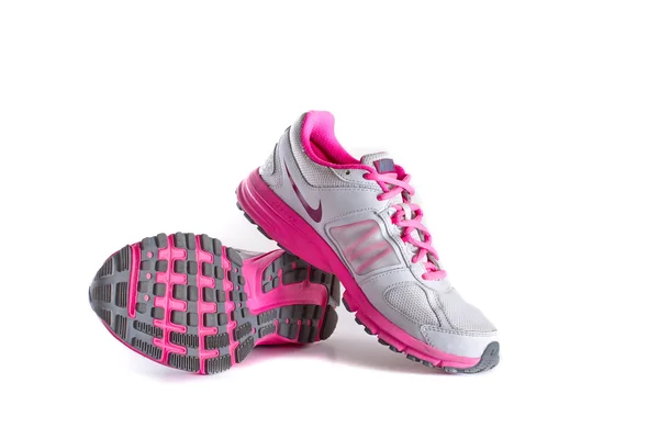 Рожевий працює взуття Nike жінок - кросівки — стокове фото