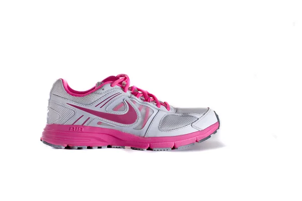 Рожевий Nike жіночого взуття біг - тапки — стокове фото