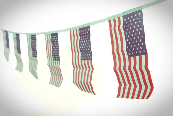 USA flags hanging proudly for July 4 Independance Day — Stockfoto