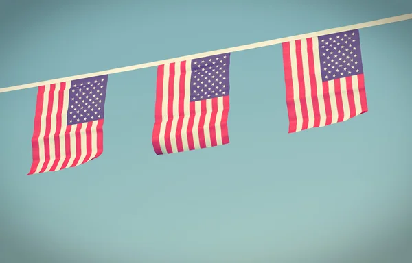 USA flags hanging prowdly for July 4 Independance Day — Stockfoto