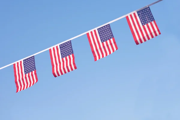 USA flags hanging prowdly for July 4 Independance Day Obraz Stockowy