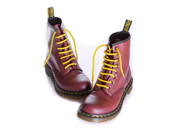 Classic cherry red oxblood Doc Martens lace-up boots — Stock Photo, Image