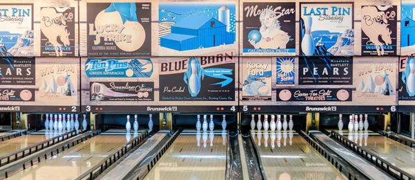 Retro style bowling alley with old-time adds — Stock Photo, Image