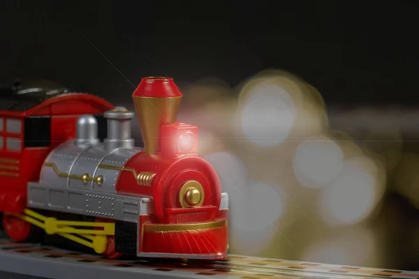 Christmas Toy Train Background Out Focus Lights Garland Close Selective — Stock Photo, Image