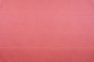 Pembe kıvrımlı karton yakın plan. Geniş doku, izole arkaplan, tasarım şablonu