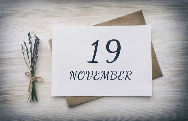 Listopad Dzień Miesiąca Data Kalendarzowa Biały Blank Papieru Brązową Kopertą — Zdjęcie stockowe