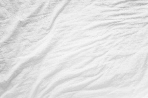 Top view of wrinkles  sheet unmade bed