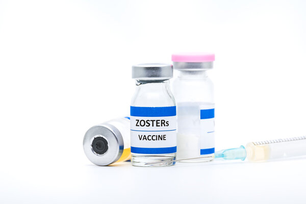 zoster vaccine with syringe on white background,medicine concept