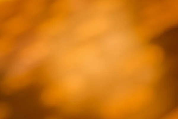 Темно-золотой фон с прожектором — стоковое фото