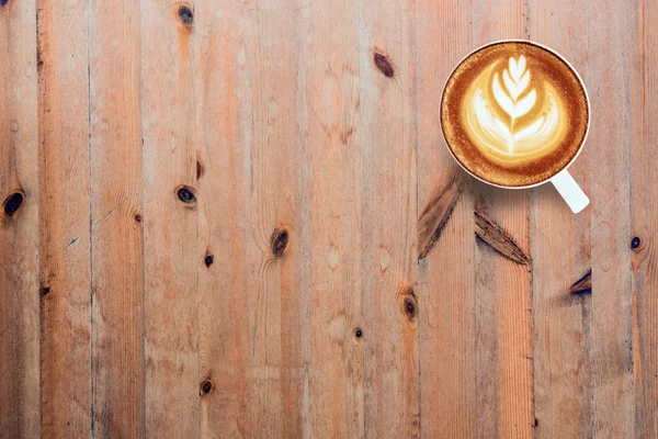 Café con leche Arte en el escritorio de madera — Foto de Stock