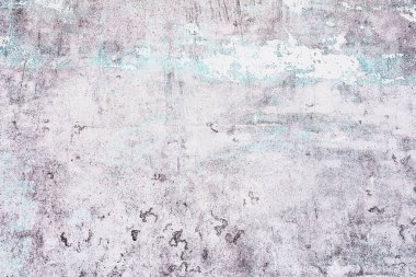 Beton duvardan dökülen mavi desenli eski beyaz.