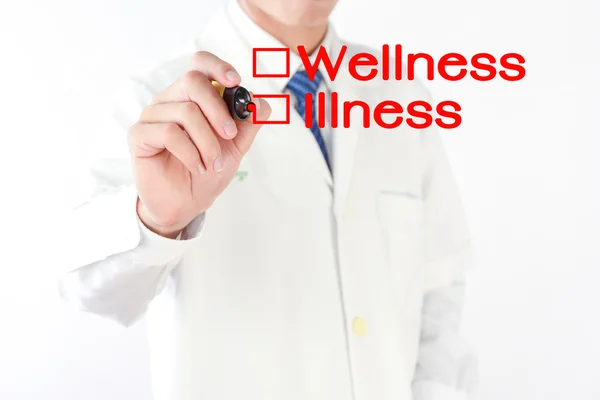 Doctor writing wellness or illness, medicine concept — Stock Photo, Image