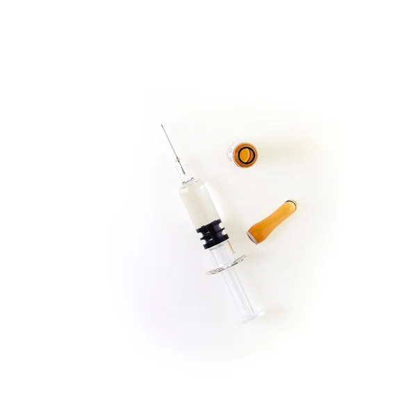 Pohled shora, ampule s injekční stříkačkou, lékařská koncepce — Stock fotografie