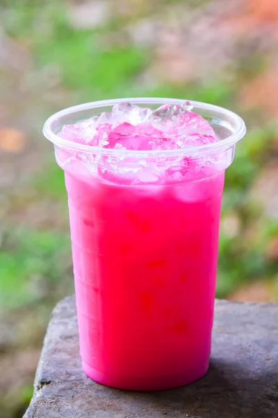 Pink milk Sweet.Cold drink relieve hot well. — Stock Photo, Image