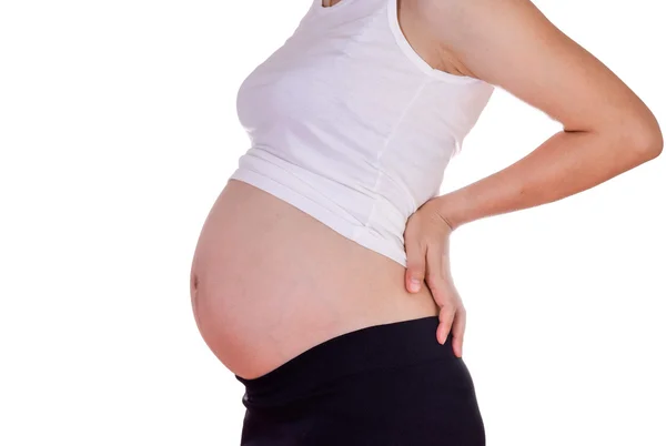 Mujer embarazada con un fuerte dolor masajeando su espalda —  Fotos de Stock