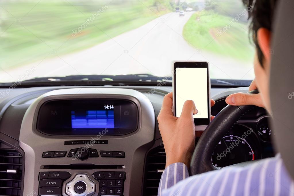 Driving while holding a mobile phone (cell phone use while driving)