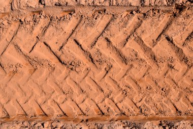Top view of wheel tracks on dirt clipart