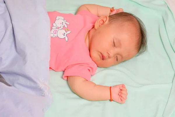 Asya bebek yüz uyku — Stok fotoğraf