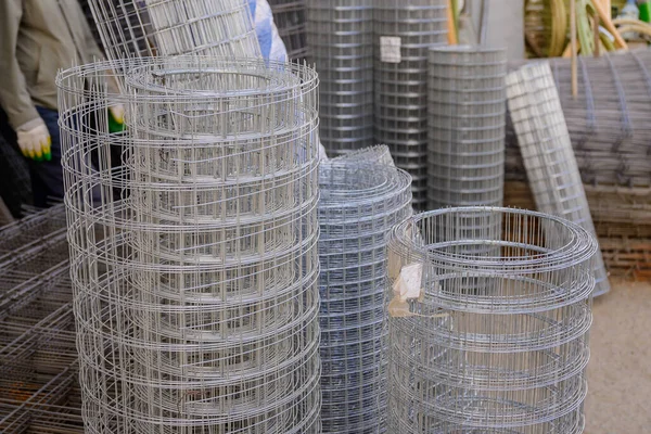 Galvanized welded wire mesh for strengthening masonry or making fences, twisted into rolls