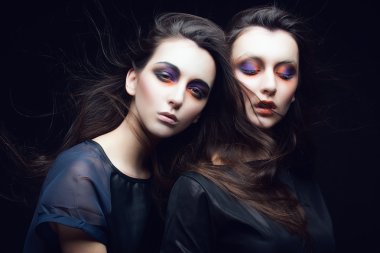 two beautiful young girls twins