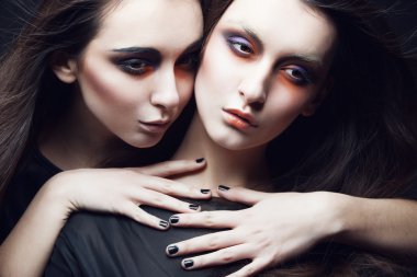 two beautiful young girls twins