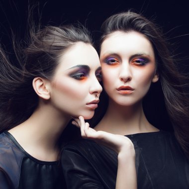 two beautiful young girls twins