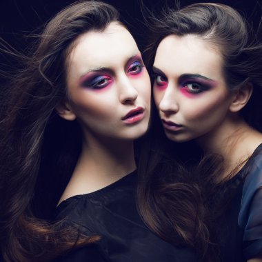 two beautiful young girls twins